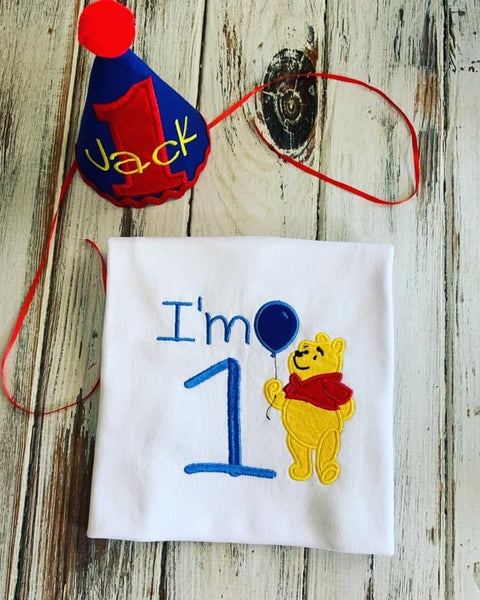 Winnie the Pooh themed birthday onesie and hat